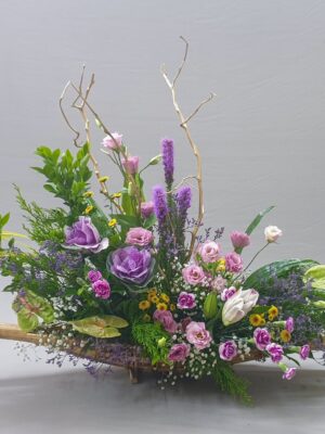 Luxury wooden flower arrangement with pastel flowers