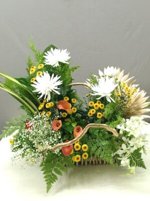 Flower side arrangement with golden basket and orchids