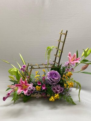 Artistic Floral Ladder Arrangement with Pink Lilies