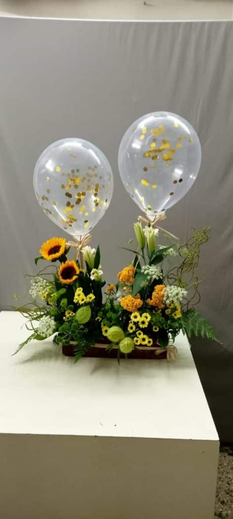 floral arrangement with balloons