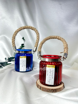 Premium Hanging Soy Candle in Glass Jar styled in front of soft curtain backdrop for elegant home decor look