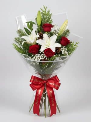 Luxury rose and lily bouquet with fresh red roses and exotic white lilium