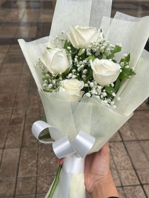 White roses, with baby's breath